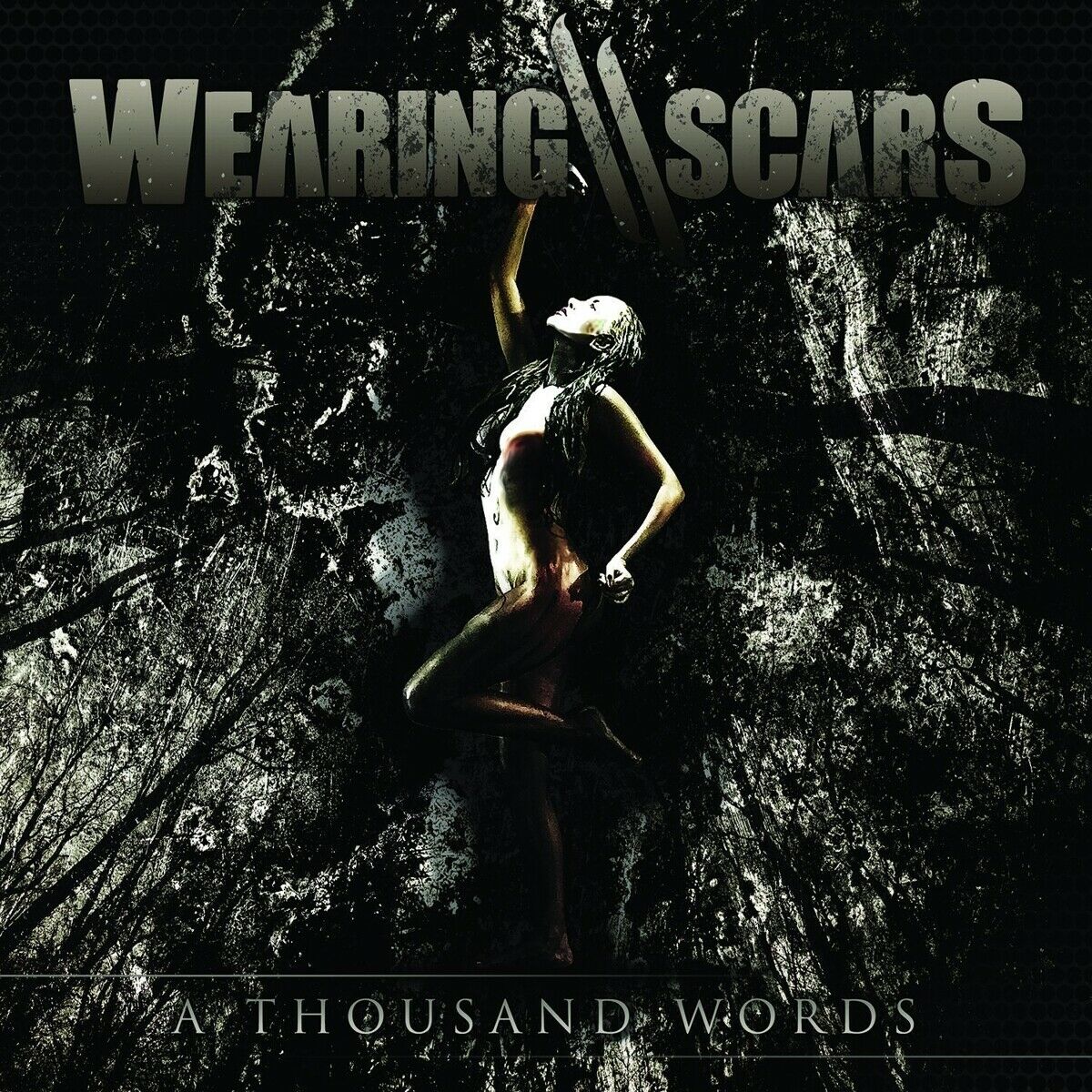 Wearing Scars - A Thousand Words i gruppen CD hos Bengans Skivbutik AB (1387214)